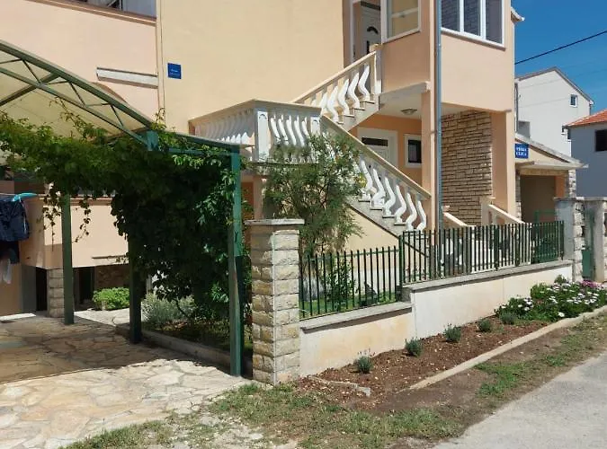 Ena, *
